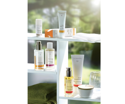 Dr. Hauschka skincare products aesthetically presented on a cabinet.