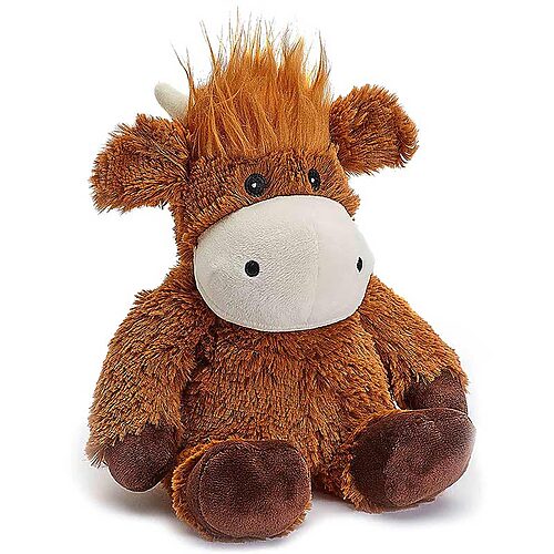 A close-up of the Warmies Highland Cow hot water bottle on a cozy blanket.