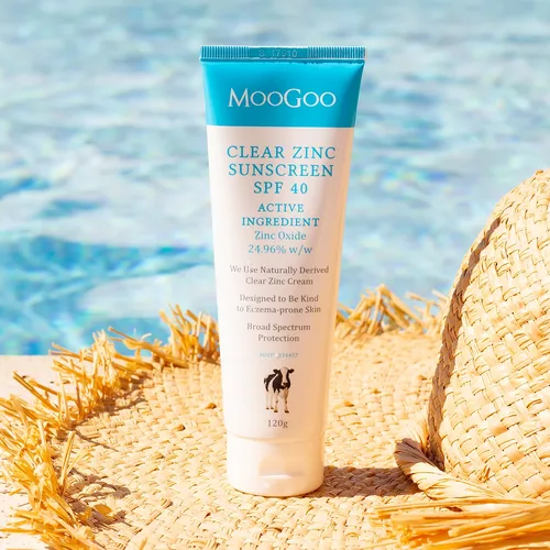 Moogoo natural suncream product displayed on the beach